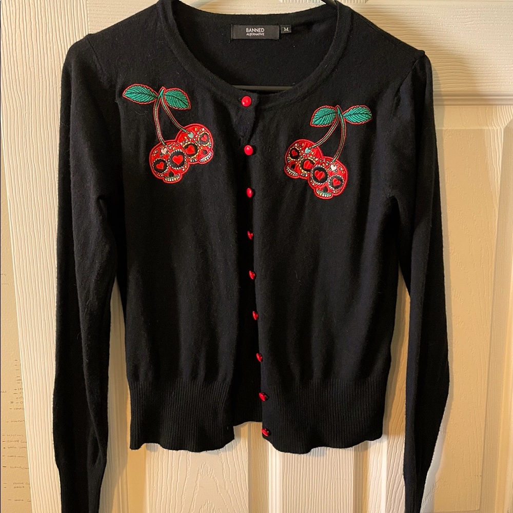 Banned alternative cardigan. Size M cherry skulls
